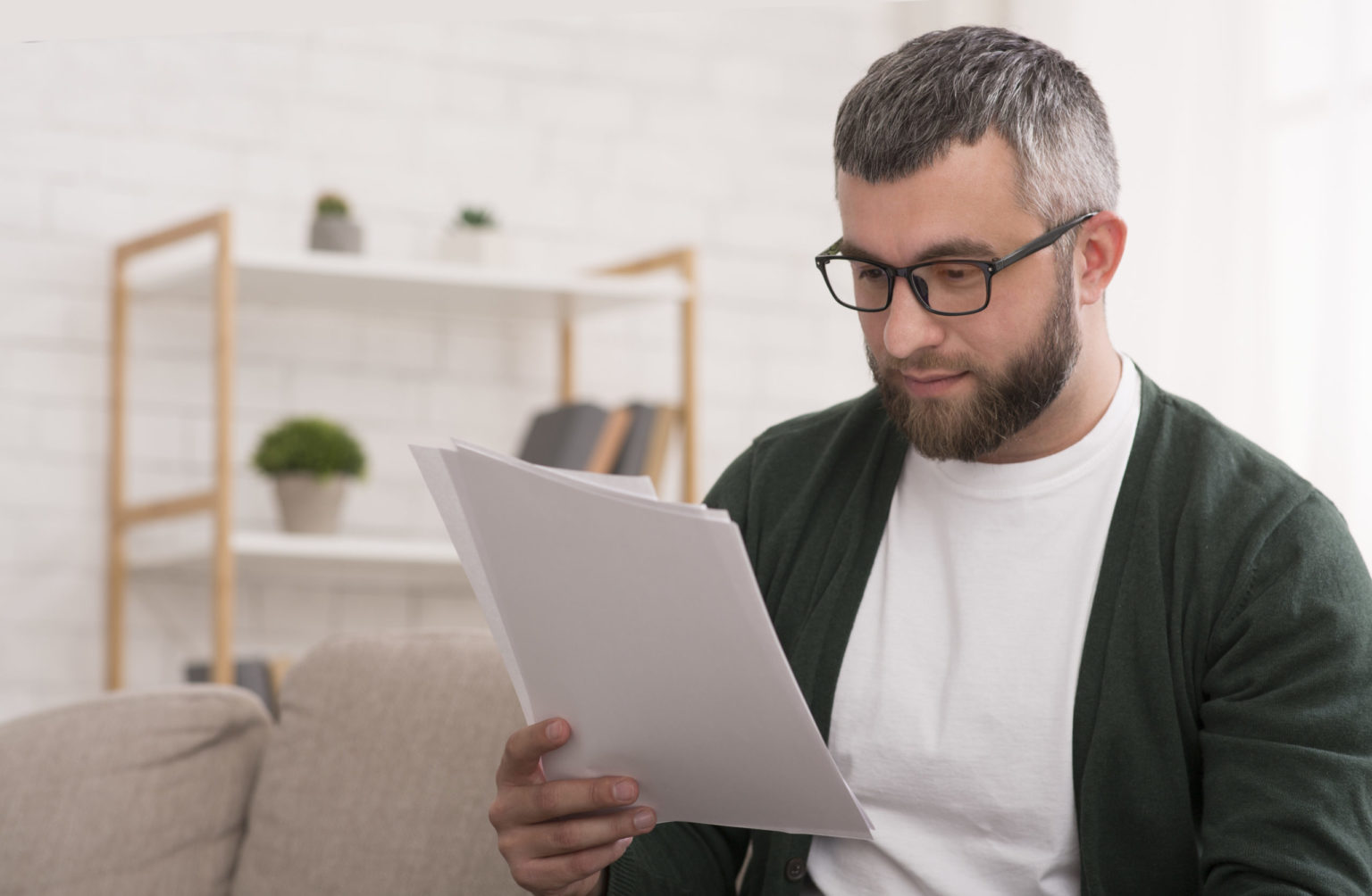 a man holding a tablet