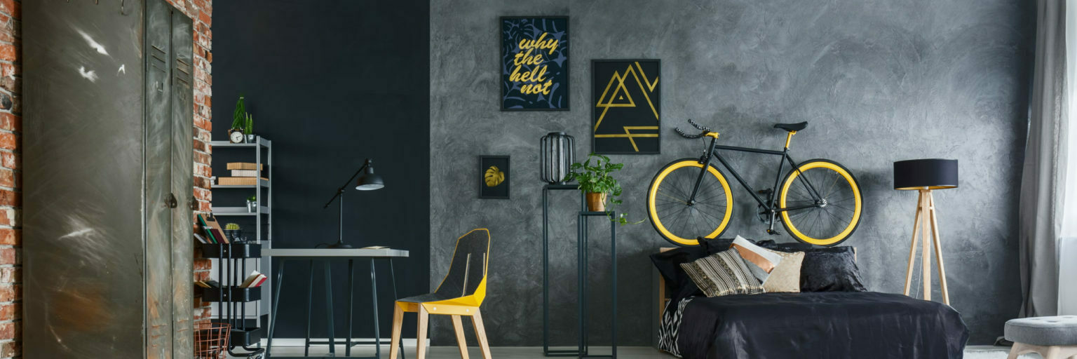 a room with a couch and a bicycle