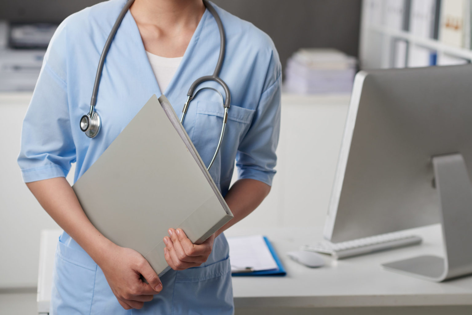 a doctor using a tablet