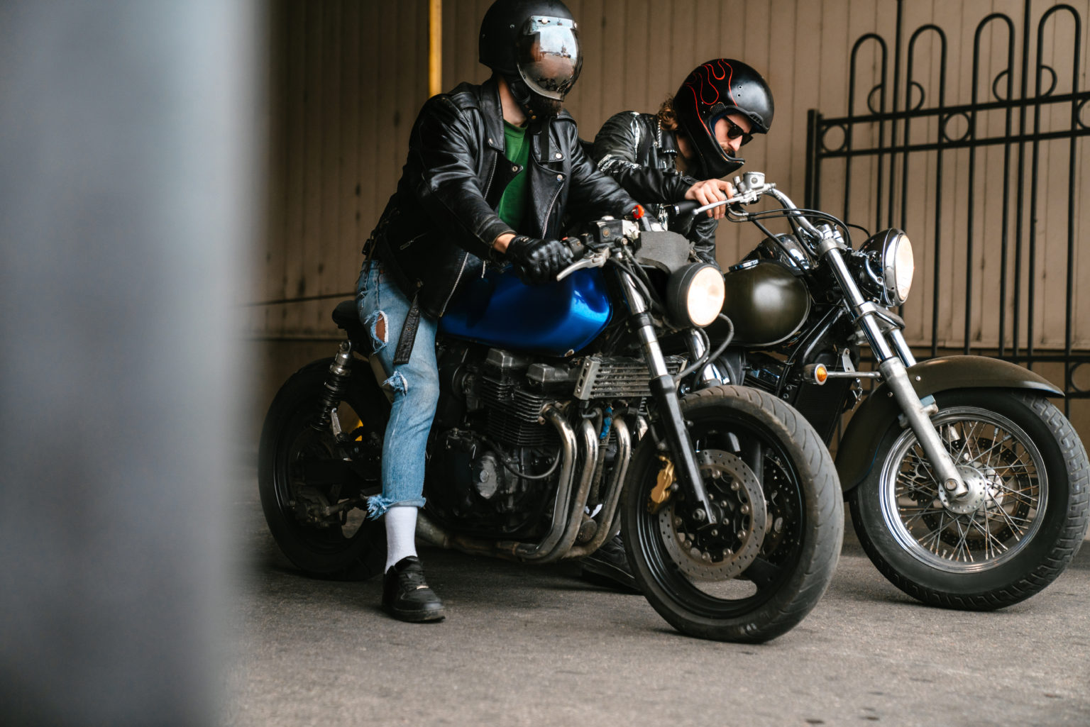 a man and a woman on a motorcycle