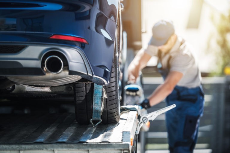 a man working on a car