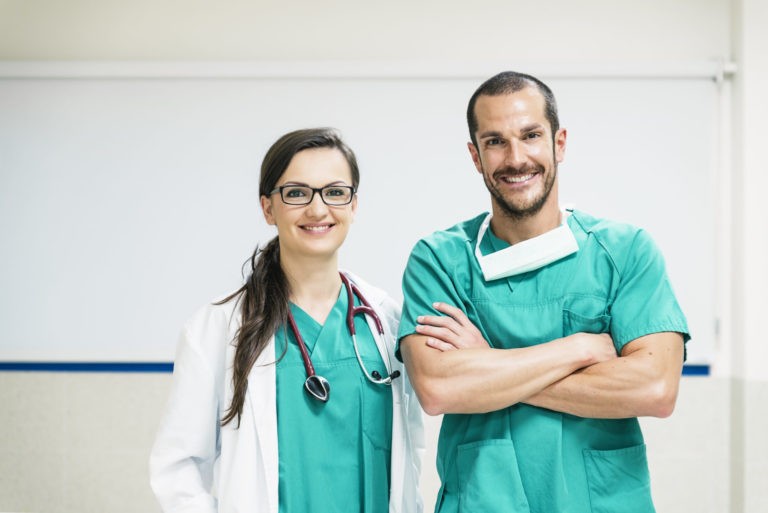 a man and a woman smiling