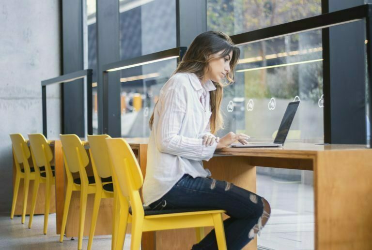 a woman sitting at a desk