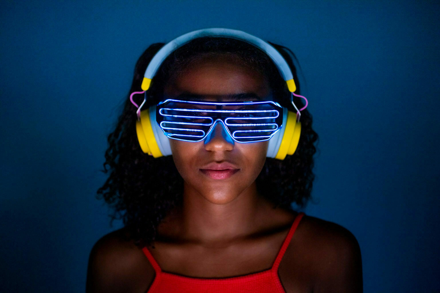 a person wearing blue and yellow goggles