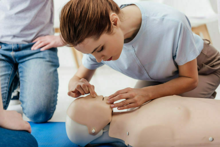 woman practicing cpr technique